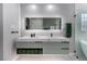 This bathroom features a dual sink vanity with marble countertop, and a light up mirror at 2617 Mason Ave, Las Vegas, NV 89102