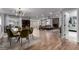 Spacious open-concept living and dining area featuring stylish decor and modern lighting at 2617 Mason Ave, Las Vegas, NV 89102