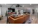 Open-concept living room with stylish decor, hardwood floors, and modern lighting fixtures at 2617 Mason Ave, Las Vegas, NV 89102