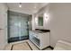 Beautiful bathroom featuring a glass enclosed shower and vanity with granite counter at 2700 Las Vegas Blvd # 505, Las Vegas, NV 89109