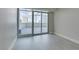Bright bedroom with sliding glass doors leading to large covered outdoor balcony at 2700 Las Vegas Blvd # 505, Las Vegas, NV 89109