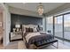 This modern bedroom features an ensuite and a private balcony with amazing views of the city at 2700 Las Vegas Blvd # 505, Las Vegas, NV 89109