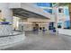 Elegant condo building entrance with water feature and landscaped accents offers a luxurious arrival experience at 2700 Las Vegas Blvd # 505, Las Vegas, NV 89109