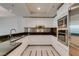 Modern kitchen features stainless appliances, granite countertops, and white cabinetry creating a clean aesthetic at 2700 Las Vegas Blvd # 505, Las Vegas, NV 89109