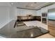Stylish kitchen with white cabinets, granite countertops, and stainless steel appliances for culinary enthusiasts at 2700 Las Vegas Blvd # 505, Las Vegas, NV 89109