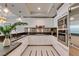 Modern kitchen features stainless steel appliances, white cabinetry, and stunning pendant lights at 2700 Las Vegas Blvd # 505, Las Vegas, NV 89109