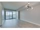 Bright and spacious living room with modern lighting and a private balcony with city views at 2700 Las Vegas Blvd # 505, Las Vegas, NV 89109