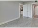 Open floor plan with hardwood floors, connecting the living and dining area at 2700 Las Vegas Blvd # 505, Las Vegas, NV 89109