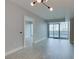 Inviting living room with wood floors, modern lighting, and access to a private balcony at 2700 Las Vegas Blvd # 505, Las Vegas, NV 89109