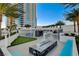 Luxurious rooftop terrace with a putting green, fire pit, seating, and city views, ideal for entertaining at 2700 Las Vegas Blvd # 505, Las Vegas, NV 89109