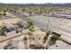 An aerial view shows the property and the surrounding neighborhood, including a commercial parking lot at 2821 Geist Cir, Las Vegas, NV 89115