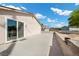Spacious back patio with sliding glass doors, ready for outdoor enjoyment at 2821 Geist Cir, Las Vegas, NV 89115