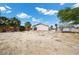 Expansive backyard with the home in the background, showcasing outdoor potential at 2821 Geist Cir, Las Vegas, NV 89115