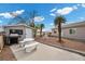 Backyard area with a built-in grill and concrete picnic table at 2821 Geist Cir, Las Vegas, NV 89115