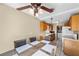 Dining area with wooden table, oak cabinets, and a view from sliding glass doors at 2821 Geist Cir, Las Vegas, NV 89115
