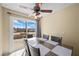 Dining area with sliding glass doors and a wooden table at 2821 Geist Cir, Las Vegas, NV 89115