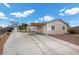 Long driveway leading to a single-story home with a covered carport at 2821 Geist Cir, Las Vegas, NV 89115