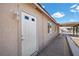 Inviting front door with decorative window on the side of the home at 2821 Geist Cir, Las Vegas, NV 89115