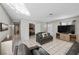 Comfortable living room with tile floors, natural light and modern furnishings at 2821 Geist Cir, Las Vegas, NV 89115