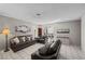 Bright living room with tile flooring and comfortable seating at 2821 Geist Cir, Las Vegas, NV 89115
