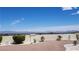 Backyard featuring rock ground cover, bushes, and a block wall at 2904 Bow Bridge Dr, Las Vegas, NV 89134