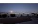 Backyard with city views at nighttime at 2904 Bow Bridge Dr, Las Vegas, NV 89134