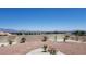 The charming backyard features desert landscaping, a block wall, and stone walkways at 2904 Bow Bridge Dr, Las Vegas, NV 89134