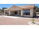 Spacious backyard with a covered patio and low-maintenance landscaping, great for outdoor enjoyment at 2904 Bow Bridge Dr, Las Vegas, NV 89134