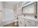 Cozy bathroom with a single vanity, a tub-shower combination, and modern fixtures at 2904 Bow Bridge Dr, Las Vegas, NV 89134