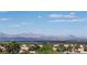 Beautiful mountain and city view with lush greenery and blue sky at 2904 Bow Bridge Dr, Las Vegas, NV 89134