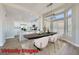 Contemporary dining room with modern furnishings and plenty of natural light at 2904 Bow Bridge Dr, Las Vegas, NV 89134