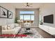 Modern living room featuring a sofa, stylish decor, and mountain views at 2904 Bow Bridge Dr, Las Vegas, NV 89134