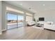 A bright and airy living room features a sliding glass door and stylish, modern furniture at 2904 Bow Bridge Dr, Las Vegas, NV 89134