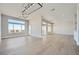Spacious and bright living room with neutral walls and hardwood floors at 2904 Bow Bridge Dr, Las Vegas, NV 89134