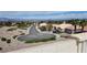 Scenic neighborhood featuring residential properties and lush desert landscaping against a mountain backdrop at 2904 Bow Bridge Dr, Las Vegas, NV 89134