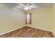 Comfortable bedroom with wood flooring, ceiling fan and lots of natural light at 3062 El Camino Ave, Las Vegas, NV 89102