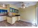Bright and airy kitchen layout features an island, modern appliances, and an inviting atmosphere for cooking and dining at 3062 El Camino Ave, Las Vegas, NV 89102