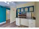 Open concept featuring an island, cabinetry, and seamless transition to adjacent spaces, perfect for entertaining and daily living at 3062 El Camino Ave, Las Vegas, NV 89102