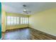 Bright and airy living room featuring ample natural light through shuttered windows, creating a welcoming atmosphere at 3062 El Camino Ave, Las Vegas, NV 89102