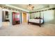 Bedroom featuring trey ceiling, an entertainment center, and plush carpet at 3910 Internet Ave, North Las Vegas, NV 89031