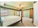 Spacious bedroom with trey ceiling, walk-in closets, and plush carpet at 3910 Internet Ave, North Las Vegas, NV 89031