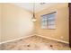 Bright dining room with tile flooring and elegant chandelier at 3910 Internet Ave, North Las Vegas, NV 89031