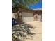 A spacious garage with stone veneer and blue recycling bins at 3910 Internet Ave, North Las Vegas, NV 89031