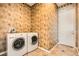 Well-equipped laundry room with modern washer and dryer, blending functionality with style at 3910 Internet Ave, North Las Vegas, NV 89031