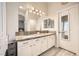 Beautiful bathroom offers double sinks and stylish lighting at 417 Carlton Kay Pl, Las Vegas, NV 89144