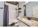 Bright bathroom with subway tile shower, modern vanity, and granite countertop at 417 Carlton Kay Pl, Las Vegas, NV 89144