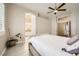 This bedroom boasts an attached ensuite bathroom and neutral colors at 417 Carlton Kay Pl, Las Vegas, NV 89144