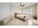 This bedroom features a comfortable bed and stylish ceiling fan at 417 Carlton Kay Pl, Las Vegas, NV 89144