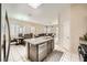Bright kitchen seamlessly connecting to the living and dining areas, perfect for modern living at 417 Carlton Kay Pl, Las Vegas, NV 89144