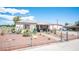 Charming single-story home with a unique desert landscaped front yard and gated entrance at 4412 Baxter Pl, Las Vegas, NV 89107